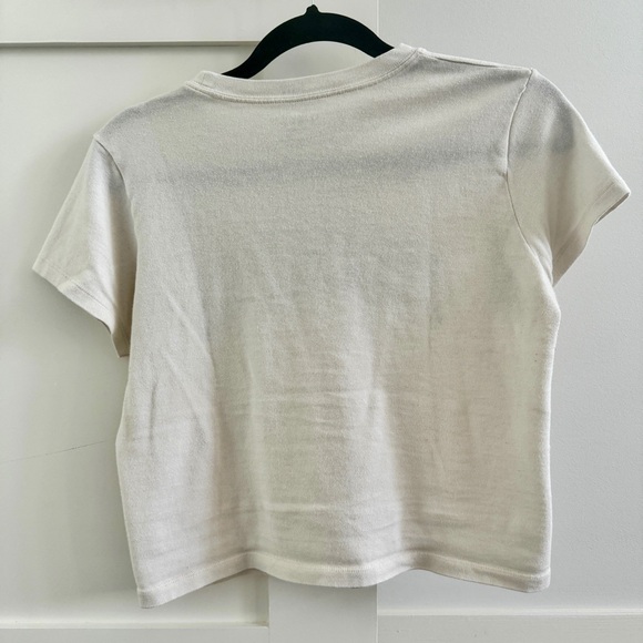 Brandy Melville White Baby Tee with “LOS ANGELES” written in dark green. - Picture 2 of 2